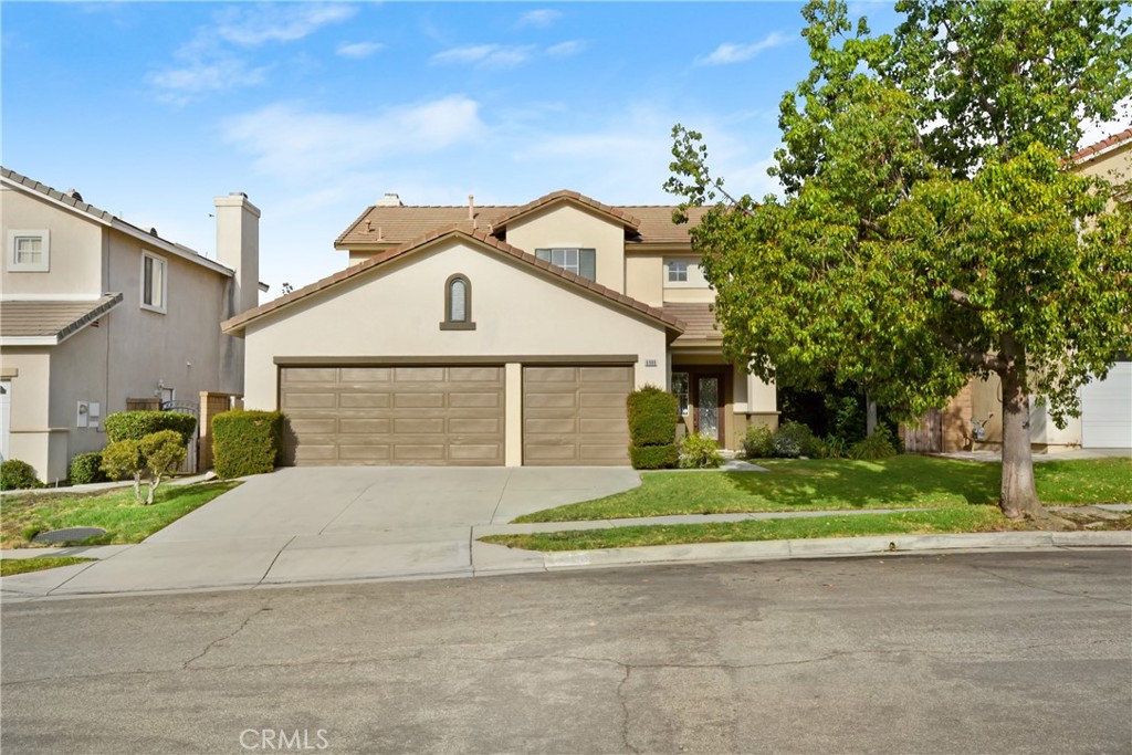 Stunning Two-Story Home in a Highly Desirable Neighborhood This beautifully maintained home offers a spacious and inviting layout, perfect for comfortable living and entertaining. The main floor features a formal living and dining room, soaring high ceilings, along with a charming remodeled kitchen that seamlessly connects to the family room, complete with a cozy fireplace. A versatile bedroom and a full bathroom with a shower provide added convenience on the first floor. Upstairs, you’ll find three additional bedrooms and a generous master suite. The master bedroom boasts ample space, a private en-suite with a separate shower and soaking tub and serene backyard views. Step outside to your private area with patio cover perfect for relaxing and entertaining. The property also features a three-car garage. Nestled in a prime location close to top-rated schools, scenic walking trails, shopping, and major freeways, this home offers breathtaking mountain views and is truly move-in ready. Make this beautiful home yours and enjoy the summer in style! NO HOA!