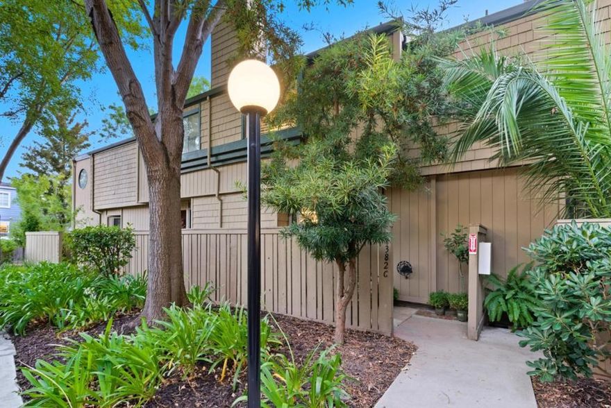This stunning property is a harmonious blend of modern comfort and stylish living, featuring various amenities catering to contemporary needs. The main floor offers a renovated kitchen with custom white painted cabinets, new refrigerator, updated countertops, newer range and dishwasher. All bathrooms have been remodeled. The house is adorned with new LVP flooring. The living room features a fireplace, while the dining area is complemented by sliding glass doors that lead to a deck for alfresco dining. Enjoy high vaulted ceilings in the bedrooms that give a feeling of airiness. Additional amenities include luxury paint, a new closet organizer in master bedroom, a convenient laundry area with a new washer and dryer, and an oversized finished 2-car garage with storage cabinets galore. The property is finished with wide baseboards, large picture framed mirrors in living and dining room, high end shutters throughout home. New ductless mini splits in all bedrooms and the living room ensures a comfortable climate. Its outstanding location is a highlight- near the Pruneyard shopping center, downtown Campbell, and less than a mile from the Los Gatos Creek Trail.