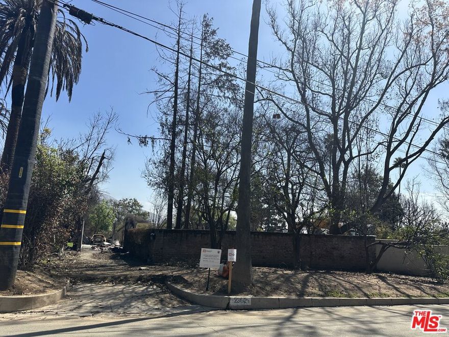 Most affordable lot in the area! This home was lost in the Eaton Fire and is being sold as land value only. Located in the upscale Estates District of Altadena, close to Altadena Golf Course with beautiful views of the San Gabriel Mountains. The lost home was a beautiful 1924 Spanish masterpiece with apx. 1,428 sf. with pool. All utilities were available before the fire. Prior home had sewer connection, water, electricity and gas stubbed to the site. Buyer to verify the current status with local providers. Sellers have no architectural plans, permits, entitlements, surveys, or other pre-construction documents. Buyer to do their own due diligence and investigations with Los Angeles County as to zoning, permitting, and any future building requirements. Buyer shall purchase the property in AS-IS condition using the VLPA form. The EPA Phase 1 Hazardous Materials removal has been completed and the sellers have opted into Phase 2 of the debris removal. View property from street only. DO NOT WALK ON PROPERTY. An exceptional opportunity to build and live among serene mountain vistas, hike nearby trails and be part of the once in a lifetime reimagining of Altadena.