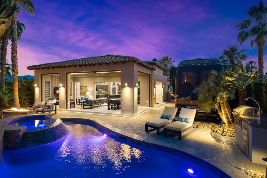 #106 DESERT SHORES RESORTOne of the most spectacular motorcoach properties you will ever find!Totally reimagined Exterior Elevation and Additions completed in 2021.The most lavish Outdoor Living Space you will find with:15' x 32' Solid-Covered PatioVoluminous 11' CeilingsRaised Patio Floor matches interior floor height for seamless floor from indoor to outdoor living spaces.Full Bathroom for dinner guests and easy access from swimming pool.Patio includes both Electric Sunshades + Security Shutters which enclose the entire outdoor living patio keeps the patio safe and clean. (Security Shutters are included on all windows and sliders throughout the property)Built-In Space Heaters + Misting System.Cantilevered Patio Floor with underlighting.Beautiful Paverstone driveway and patio spaces and Epoxy Coach Pad.Freeform Pool with Quartize Spa with new Pebble Finish offers Raised Bond Beam at back of pool for privacy + LED Lighting and Pentair Remote Control System.Blue-Glass Fire Pit.BBQ grill area with wood-pellet memphis Smoker/Grill.Entry Gate for Privacy.Raised Santa Barbara Smooth Stucco exterior with Eldorado Stone Trim.Newer Landscaping and Ground Lighting.Raised RV HookUp Pedestal.Wrought-Iron Fencing to keep your Doggies secure.INTERIOR FEATURESRecent and Beautiful Remodeled Interior.Great Room/Kitchen opens to spectacular outdoor living spaces.Upgraded Granite Slab Counters.