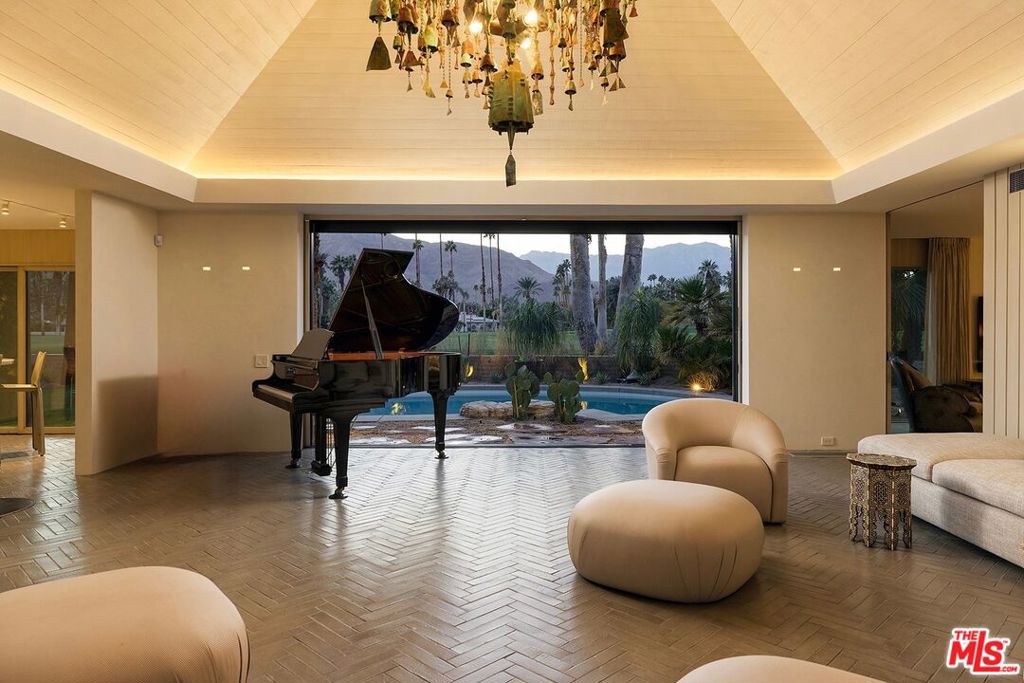 Built in 1963 this gorgeous William Cody house has been completely restored to it's original glory. Located in prestigious Thunderbird Country Club, it boasts full mountain views across Hole 13. 3 bedroom + convertible TV room, 4 bathroom, pool and luxurious sunken seating area with firepit. 3300 sq ft of the best materials and interiors designed by Darren Brown, landscape by Studio John Sharp. Kitchen by Poggenpohl with state of the art Dacor appliances. Herringbone floor of handmade Fireclay tile. Full house electronics & Sonos. Media room with digital surround sound system. 2 car garage with off street parking for an addl 3 cars. 15 minutes to historic Palm Springs and also high shopping district of El Paseo in Palm Desert..
