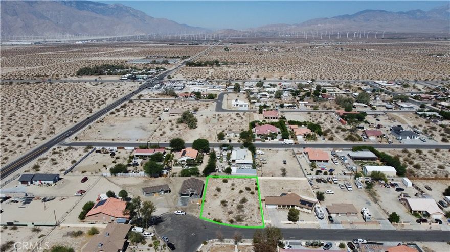 Prime 17,424 sq ft lot in the unincorporated area of Dos Palms. Situated in Desert Hot Springs with versatile W-2 zoning—offering a wide range of potential uses including single-family residential, limited agricultural, and light commercial (buyer to verify). Located on Parcel #657-142-015, this spacious and level lot is a great opportunity for investors, builders, or entrepreneurs looking to develop in a fast-growing community. Enjoy mountain views, serene surroundings, and at short distance to Fwy I-10, close proximity to Palm Springs, Joshua Tree, and the Coachella Valley. Easy access to utilities nearby and paved road frontage makes this lot ideal for building a custom home, vacation rental, or long-term income property. Schools, shopping, and services just minutes away. With Desert Hot Springs continuing to expand and attract development.  You can't miss on this property with great potential!