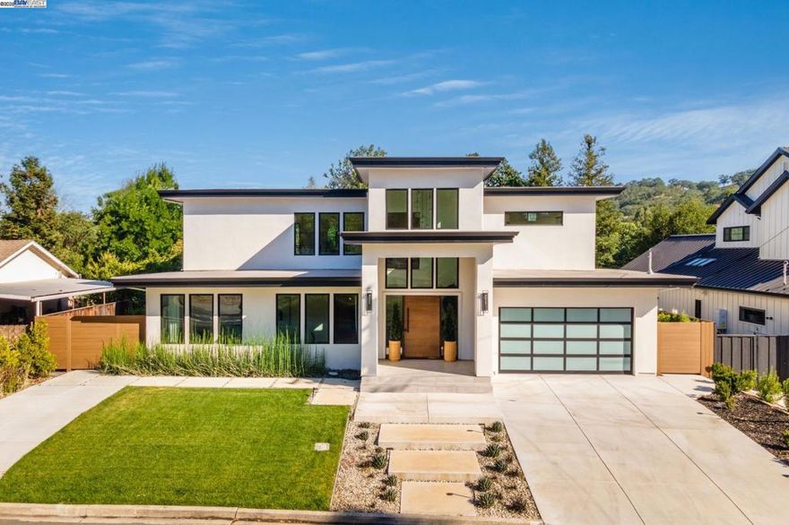 This extraordinary home redefines luxury in Danville, blending timeless appeal with visionary design. Move-in ready and meticulously appointed, it promises a lifestyle of comfort, sophistication, and effortless entertaining. Don’t miss your opportunity to experience the elegance and grandeur of this unique property which includes a custom pivot entry door for a stunning first impression, multiple en-suite bedrooms for ultimate privacy and comfort, expansive outdoor living spaces with plenty of space for a sparkling pool/spa, views of the greenery alongside Diablo Country Club, and abundant natural light with a seamless indoor-outdoor flow.  Even your pets have a custom pet shower located conveniently in the laundry room.  This is luxury living at it's finest.