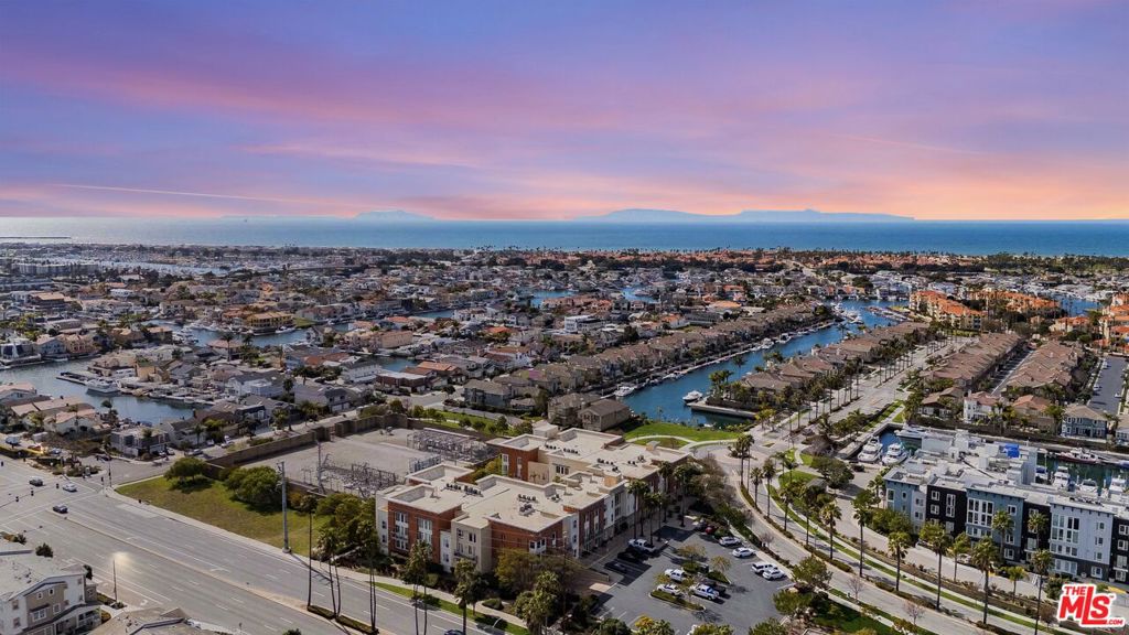 Welcome to coastal luxury in the heart of the coveted Port 121 enclave at Seabridge Seaside Harbor. This beautifully appointed 1-bedroom, 2-bath condo offers a spacious, light-filled layout with an open-concept design and stylish finishes throughout. Enjoy granite countertops in both the kitchen and baths, a convenient in-unit stackable washer and dryer, and impressive storageincluding two generous walk-in closets plus a flexible bonus area perfect for an office, workout zone, or guest nook. Privately tucked away at the quiet end of the first-floor hallway, this unit offers exceptional privacy and a tranquil ambiance. Step outside to resort-style amenities including a serene courtyard with a soothing fountain, built-in BBQ area, and access to the sparkling community pool, spa, private clubhouse, and scenic walking paths. Just moments from Ventura Harbor's vibrant dining, shopping, and entertainment, this is a rare opportunity to embrace the Seabridge lifestylewhere everyday living feels like a vacation.