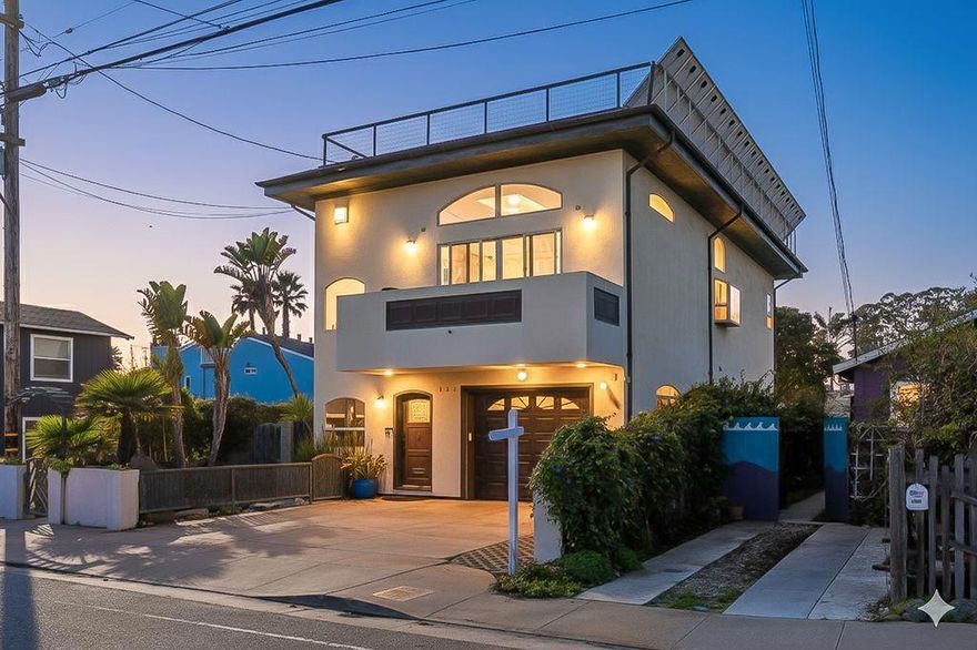 Extraordinary custom home in prime pleasure point location. Home was built in 2005 built with the finest quality materials.  Imported italian marble floors,  spiral entry staircase with stainless handrails,  commercial 3 story elevator, birds eye maple cabinetry,  Brazilian granite slabs, commercial skylights, Sub zero refrigerators,  six burner wolf stove and hood,  kitchen island with wave sink feature,  two balconies,  The basement is a finished 1500 SF family room.  Koi pond next to entry is surrounded by tropical vegetation, bronze fences and gate and a walkway that leads to the private backyard oasis.