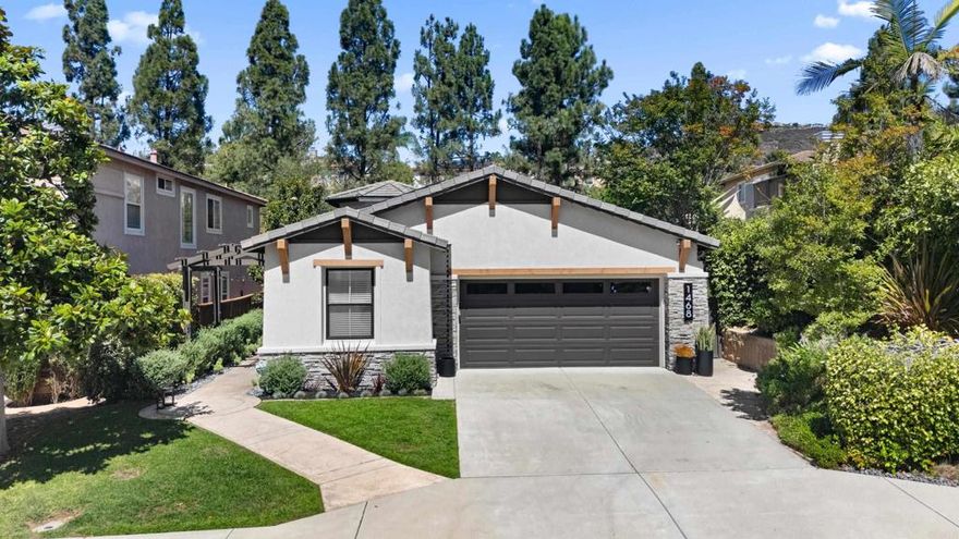 Discover this rare single-level residence ideally located in the heart of San Elijo Hills—just minutes from shops, parks, trails, and top-rated schools. Recently refreshed with premium stonework, custom corbels, and a warm, welcoming charm, this home offers both style and comfort.  Inside, enjoy new lighting, designer fixtures, updated hardware, KitchenAid appliances, and new carpeting in the bedrooms. The remodeled guest bath features a luxurious Kohler soaking tub. Energy-efficient upgrades include a solar system with 125% production, a newer water heater, smart garage door, and updated furnace.  The backyard is your private sanctuary, featuring newly added high-quality turf, succulents, ferns, and a lime tree—all set against peaceful tree-lined views.  Located in desirable “lower San Elijo Hills”, close to town center conveniences, scenic hiking trails, and zoned for San Elijo Elementary, San Elijo Middle, and San Marcos High School.