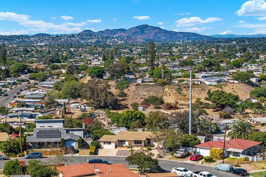 Where else can you find a single level home with a panoramic view in a great location at this price? Welcome to this wonderful 3 bedroom home located near tons of shopping, restaurants, SDSU, and much more. Your new home features 3 full bedrooms (garage was converted to a bedroom and laundry room), updated kitchen with solid surface countertops and tons of storage, spacious dining room, and oversized living room with cozy fireplace and mini-split. The private backyard features a reinforced patio (imagine enjoying your favorite gatherings) plus large backyard area with incredible views. With such a wonderful floor plan, great yard, and scenic views plus fresh exterior and interior paint throughout, this home is just what you've been looking for. Welcome home!