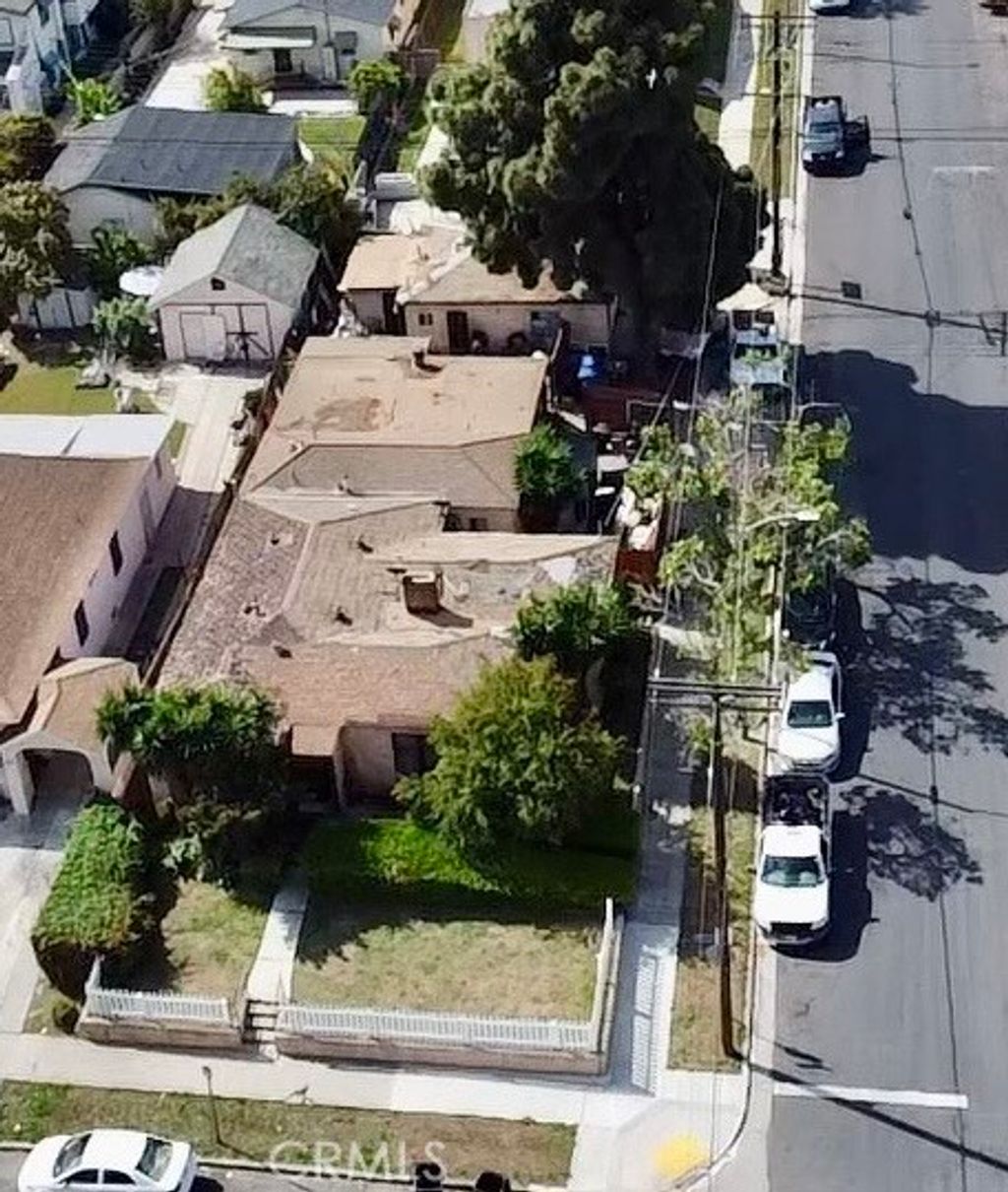 Photo of 1858 W 77th St, Los Angeles, CA 90047 (MLS # SB26083434)