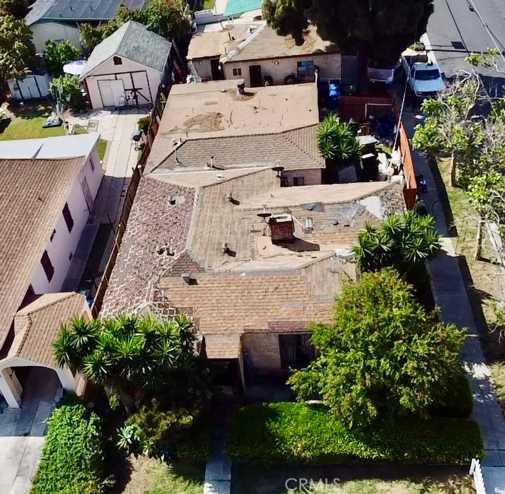 Photo of 1858 W 77th St, Los Angeles, CA 90047 (MLS # SB26083434)