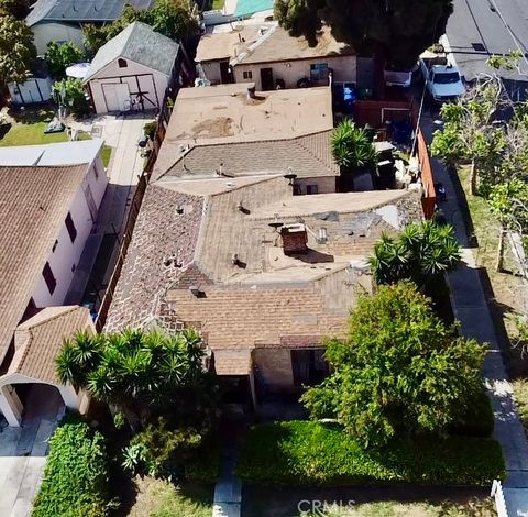 Photo of 1858 W 77th St, Los Angeles, CA 90047 (MLS # SB26083434)