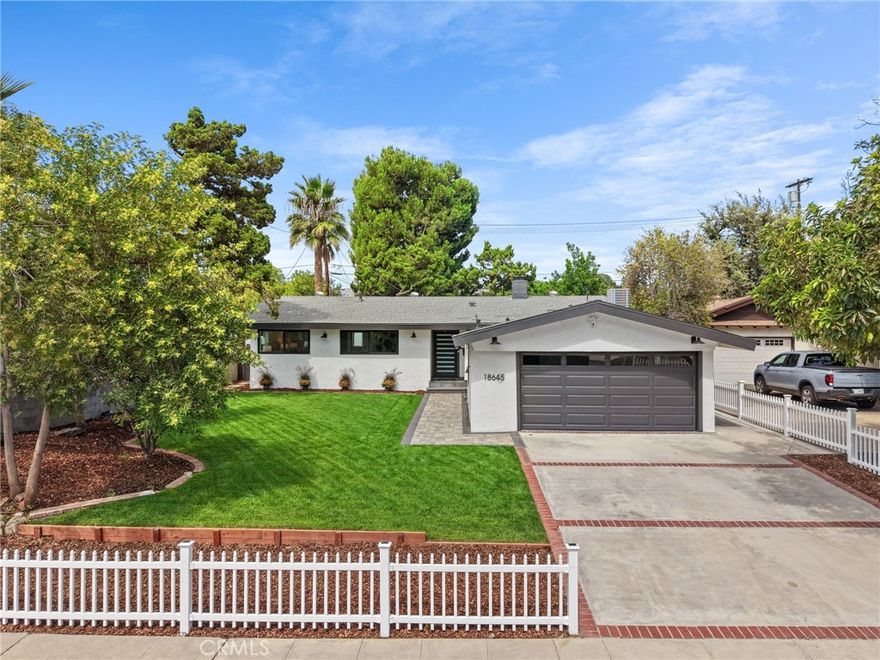 Welcome to this meticulously reimagined residence, set on a quiet cul-de-sac in a desirable Northridge neighborhood. Blending modern elegance with lasting comfort, the custom kitchen showcases quartz countertops and backsplash, sleek soft-close cabinetry, premium fixtures, and updated appliances, making it ideal for everyday living and entertaining. The spacious living room features a contemporary media wall with surround sound, a designer fireplace, and recessed LED lighting. Thoughtful upgrades throughout include new energy-efficient windows and doors, brand-new plumbing, a 200-amp electrical panel, and a complete HVAC system with Nest thermostat. All three bathrooms have been fully remodeled, with the spa-inspired primary suite offering dual shower heads and refined finishes. Step outside to your own private retreat with a renovated heated pool, 7-person jacuzzi, and inviting spaces perfect for morning coffee or dining al fresco. The front yard complements the home with new landscaping, pavers, and a full irrigation system for easy maintenance. The complete home makeover, with too many upgrades and renovations to list, allows this unique home to offer you worry-free peace of mind and unlimited comfort for many years. Ideally located near Trader Joe’s, Northridge Fashion Center, parks, dining, and a top university, this move-in ready residence is a special opportunity to enjoy turnkey living in a prime location.