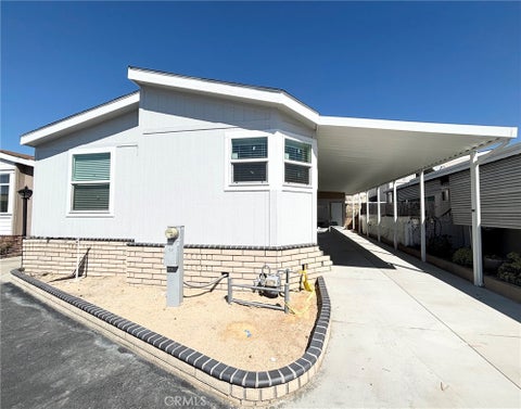 Photo of 301 E Foothill Boulevard #130, Pomona, CA 91767 (MLS # CV26200110)