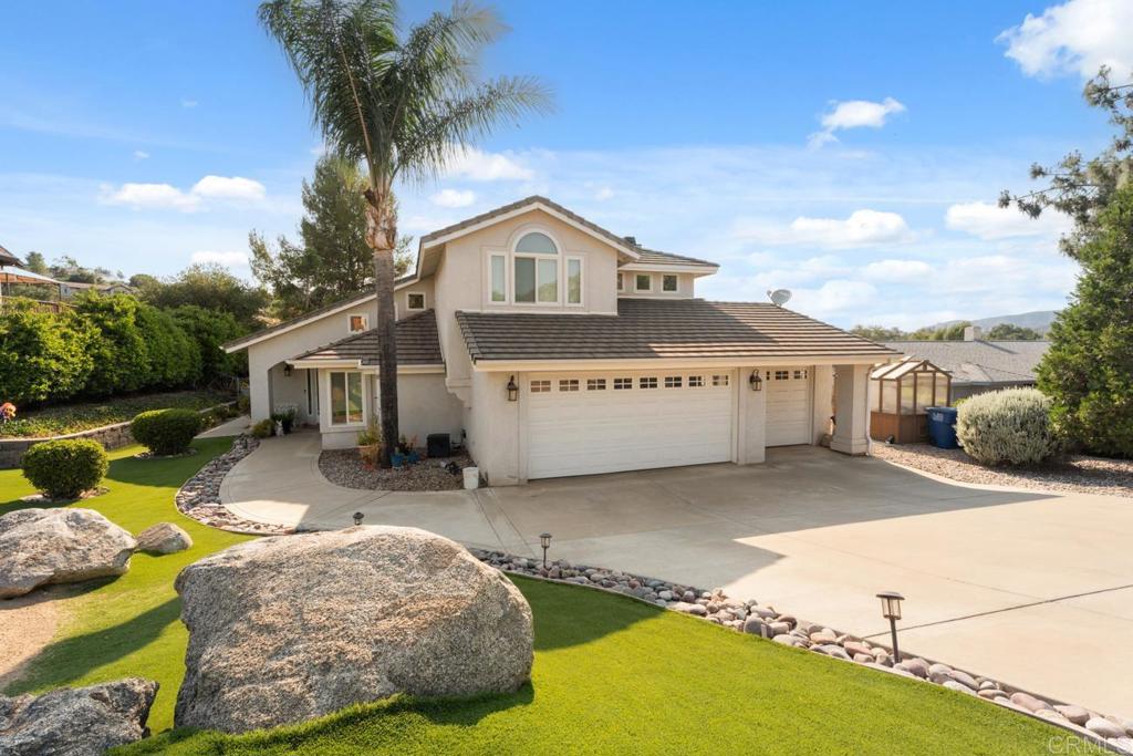 This beautifully updated 4-bedroom, 3-bath home offers the perfect blend of comfort, style, and functionality on a spacious, usable and private equestrian lot. Step inside to vaulted ceilings and an abundance of natural light pouring through brand new windows. The upgraded kitchen boasts a new double oven, gas range, and modern finishes—ideal for the home chef. Luxury vinyl plank flooring runs throughout the home, adding warmth and durability. The home is adorned with 19 SOLAR panels. Recent upgrades include new windows throughout, new toilets, a high-efficiency furnace, and a smart thermostat for year-round comfort. For animal lovers, enjoy a custom-built catio and a fully functional equestrian setup complete with two horse corrals, shelters, and a dedicated feed shed. The outdoor space is made for both leisure and practicality, featuring a low-maintenance full-yard irrigation system, your very own putting green, animal run and a greenhouse to grow year-round. A huge three car garage allows you to store your toys and more. The amenities of being in the San Diego Country Estates community allows for tennis, pickleball, golfing, 55 miles of equestrian/hiking/biking trails, 2 equestrian centers, dog parks, kid parks, concerts in the park, lodge, restaurant, clubhouse, vacation rentals, tennis club, spa AND MORE! Whether you're entertaining guests or enjoying peaceful country living, this property has it all—upgraded, move-in ready, and thoughtfully designed. Don't miss your chance to call this Ramona gem home!
