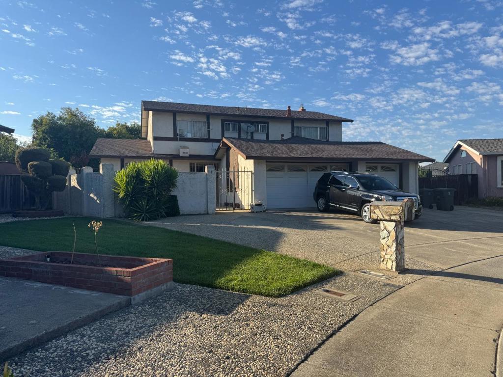 This spacious 5-bedroom, 3-bathroom home has tons of potential, offering a generous ~2,632 sq ft of living space on a lot size of ~7,500 sq ft with a pool and a hot tub. This home has one downstairs bedroom and full bathroom, the other 4 bedrooms and 2 bathrooms are upstairs. It has both a living room and a family room, and a 3-car-garage. Huge side yard with ample space for a large vehicle, or possibly a boat or RV. This home needs TLC but for someone with vision it's an incredible opportunity.