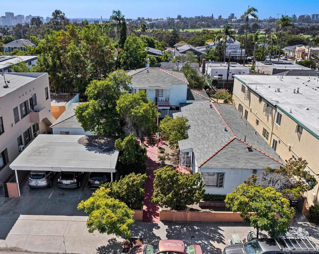 Situated in a quiet, low density neighborhood. This block has minimal traffic, which adds to the tranquility for residents. While some areas have 4-10 story towers but quite limited parking, these apartments are perceived as friendlier, calmer, more congruent with its neighborhood. The seller expects to pay a portion of the buyers closing costs. The adjacent 4 unit property at 2122 30th St and 10 units at 2144 30th St are also for sale by the same seller, making 3 contiguous parcels a possibility. Video tour will be active soon.