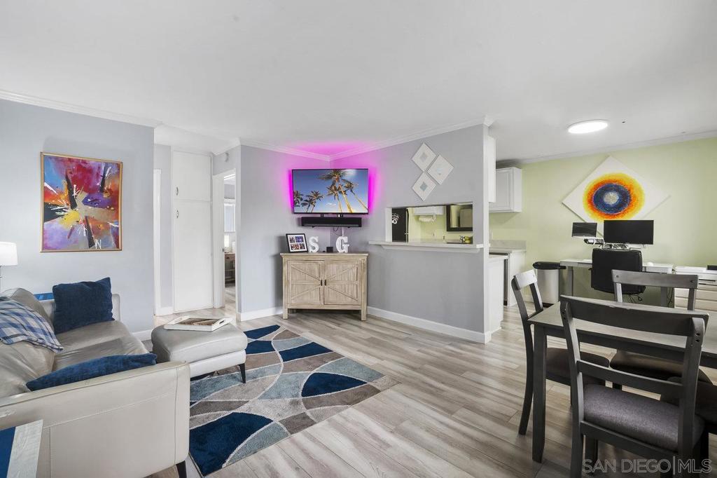 Own a Piece of Hillcrest’s Vibrant Lifestyle! Welcome to Essex Manor, a charming boutique 8-unit complex perfectly situated just one block from Hillcrest’s lively shops, acclaimed restaurants, trendy bars, and entertainment hotspots. This bright and airy top-floor condo offers an open floor plan with brand-new flooring and a fresh, neutral color palette that creates a warm and inviting atmosphere. The updated kitchen is a chef’s delight, featuring sleek countertops, crisp white cabinetry, and stainless steel appliances, ideal for both everyday meals and entertaining guests. The spacious bedroom boasts mirrored closets that enhance light and space, along with convenient extra storage just outside the bathroom to keep your home organized and clutter-free. This turn-key, move-in ready condo is designed for your immediate comfort and convenience. Step outside and enjoy unparalleled walkability to Balboa Park’s gardens, trails, and museums, as well as easy access to major freeways, public transit, and medical centers. With a low monthly HOA fee that includes water, common area maintenance, and exterior landscaping, this home offers comfortable, hassle-free city living. Ideal for first-time buyers, professionals, or anyone eager to embrace the ultimate walkable San Diego lifestyle in one of the city’s most dynamic neighborhoods.