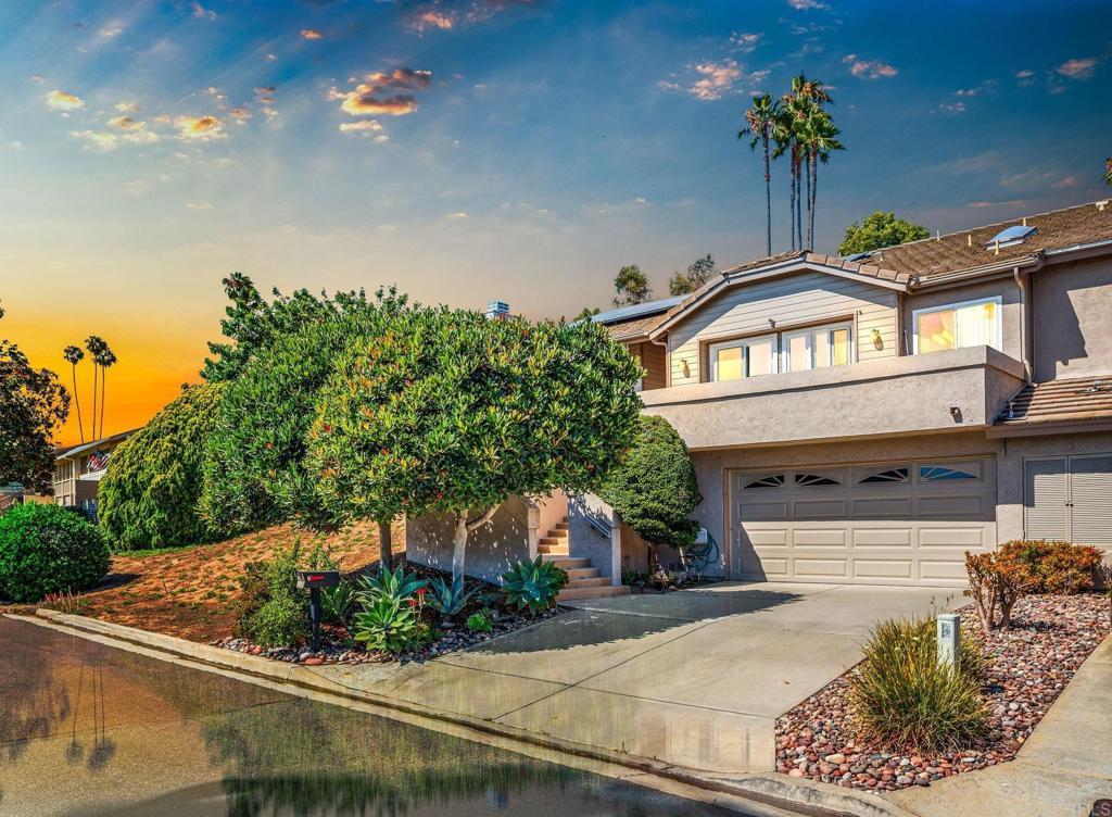This move-in ready home is located in the gated Terrace Downs community in Bonsall, CA. Enjoy privacy, beautifully maintained grounds, a community pool, and proximity to River Village shopping and top-rated Bonsall schools. The open floor plan features vaulted ceilings, a spacious living room with fireplace, and a south-facing composite deck perfect for relaxing or entertaining. The stylish and functional kitchen includes granite countertops, wood flooring, recessed lighting, pull-out shelving, and a bright breakfast nook with scenic views. The dining area opens to a private stone patio with a retractable awning. The primary suite offers a walk-in closet, en-suite bath with skylight, soaking tub, and large shower. Two additional bedrooms are located on the opposite side of the home. All bedrooms have new carpet, and both bathrooms feature updated toilets. HOA covers yard and exterior maintenance, irrigation water, roof, gated security, and pool access. Though the home lives like a single story, there are stairs from the garage or driveway to the main level. No age restrictions. This well-maintained home blends comfort, convenience, and the beauty of Bonsall living.