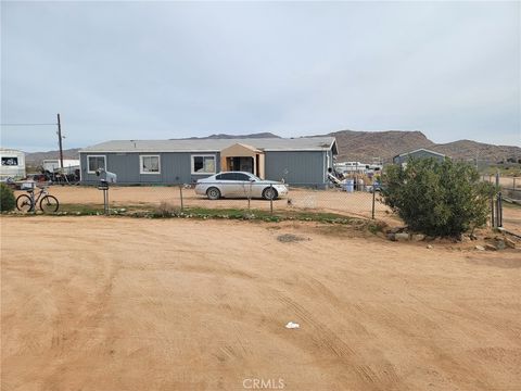 Photo of 13033 Joshua Rd, Apple Valley, CA 92308 (MLS # HD26015086)
