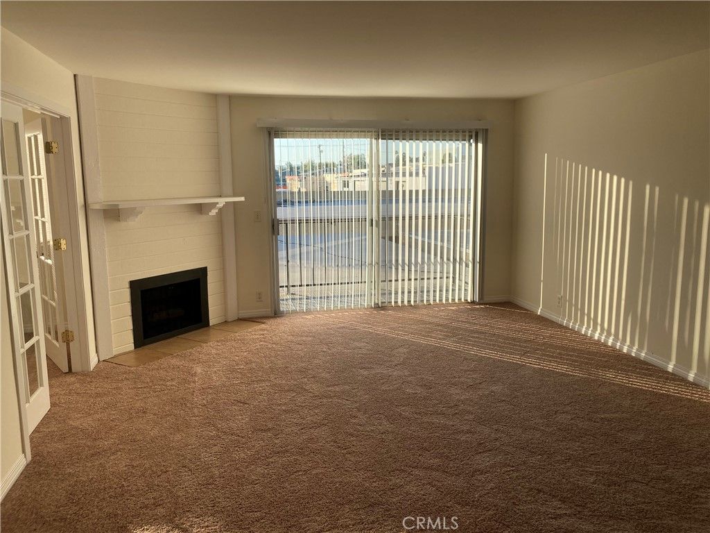 Photo of 8505 Columbus Avenue #211, North Hills, CA 91343 (MLS # IN26095721)