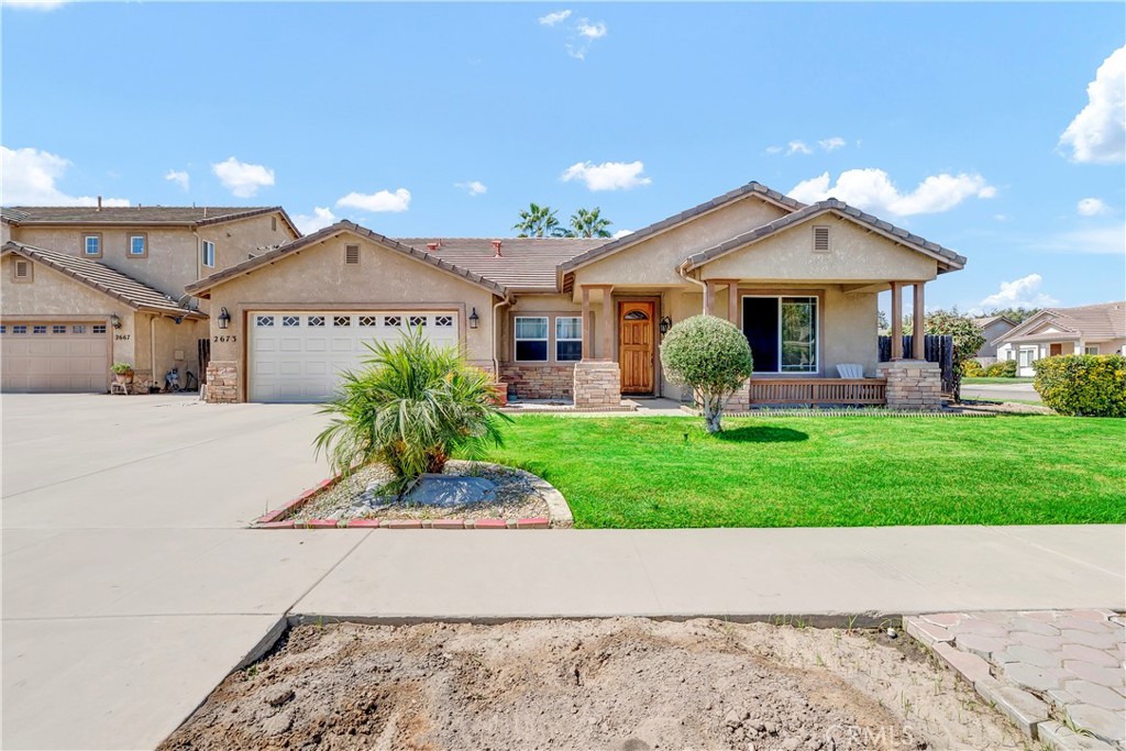 Welcome to this immaculate 4-bedroom, 3-bath home , perfectly situated on a desirable corner lot in Tulare. With over 2,100 sq. ft. of living space, this residence offers a thoughtful floor plan that includes two master suites with walk-in closets, a dedicated office, and an inviting living room complete with a cozy fireplace and crown molding throughout.
The kitchen and dining area flow seamlessly for entertaining, while the front porch and expansive covered back patio provide the perfect spaces to enjoy outdoor living. Recent updates include new carpet, a new garage door, recently fumigated, and a brand-new patio roof (2025) with certification and warranty also covering the main roof.
Additional highlights include hardwood floors in the office, a spacious backyard with multiple fruit trees, and a private outdoor lounge area ready for gatherings. Ideally located close to neighborhood parks and an elementary school, this home checks all the boxes for comfort, convenience, and charm.