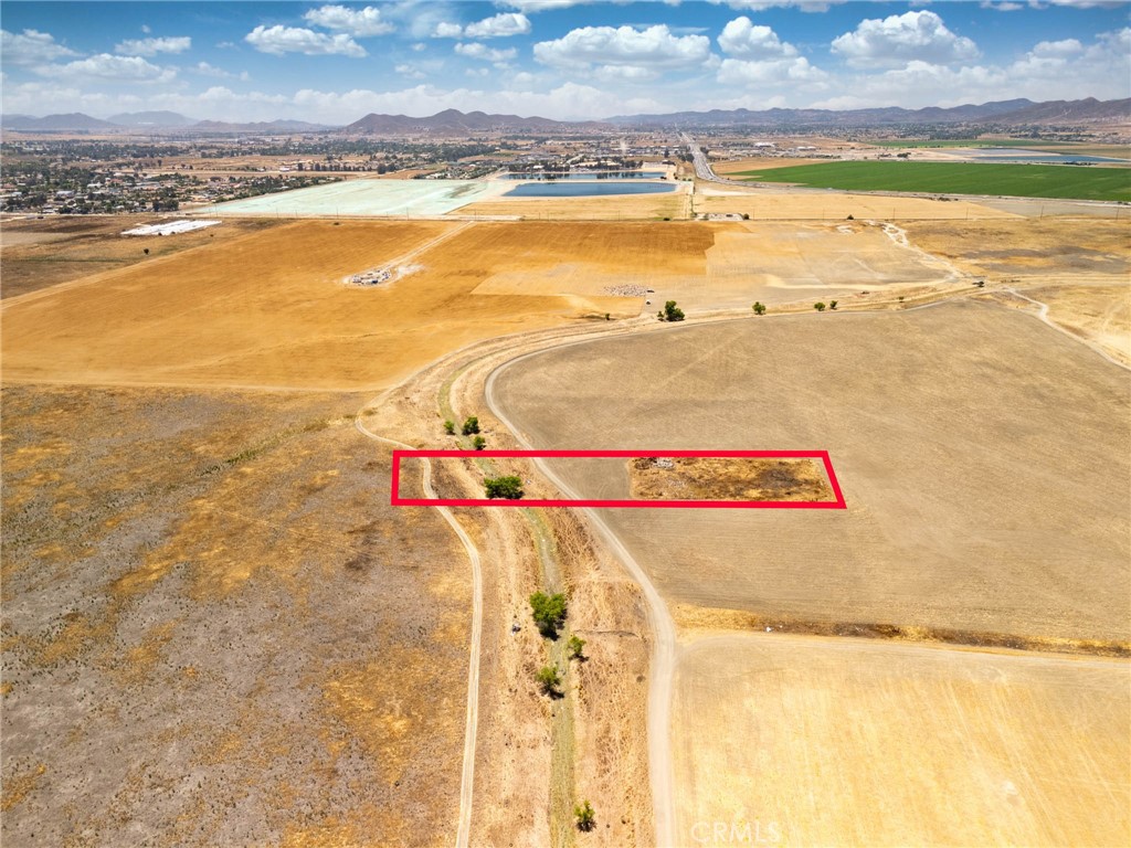 DEVELOPERS AND INVESTORS YOU DONT WANT TO MISS THIS !!!
Incredible opportunity to own 4 acres of flat, usable land in Perris, CA. This vacant parcel offers paved road frontage on San Jacinto Ave and is ideally
located near Hwy 74 and I-215, providing easy access to nearby cities and amenities. The lot is zoned residential (buyer to verify zoning and all
permitted uses with Riverside County). Electricity nearby; buyer to verify water and septic requirements. Ideal for custom home, manufactured home,
ranch, or investment hold. Surrounded by a mix of residential and agricultural properties in a fast-growing area of Riverside County.