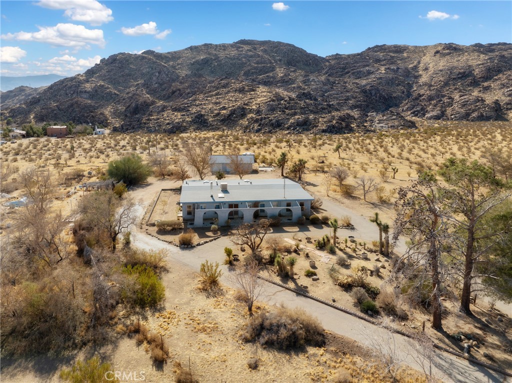 NEW FOUNDATION, NEW SEPTIC, WELL WORKING GREAT. Nestled on over 29 acres of pristine rural land, this breathtaking oasis getaway offers the perfect blend of tranquility, adventure, and modern comfort. The property features a spacious 2,900 sq. ft. home with 3 bedrooms and 2 bathrooms, providing ample room for relaxation and recreation. With its inviting open layout, the home is designed to bring the natural beauty of the surrounding landscape indoors, offering expansive views.
The property also boasts a detached 2-car garage with an attached workshop, ideal for those who love to tinker or need extra storage space for tools, toys and equipment. Powered by a paid-for solar system, the home offers sustainable living while keeping energy costs low. A private well provides ample water, and the small pond adds a peaceful touch, making the setting even more idyllic.
The main house is fenced for privacy and security, the property is perfect for outdoor enthusiasts. Whether you're an avid hiker, enjoy exploring on off-road vehicles, or simply want to immerse yourself in nature, this land offers endless possibilities. The expansive acreage ensures that you’ll have plenty of room to roam, while still enjoying the comforts of a well-appointed home.
This is more than just a house—it's a lifestyle. Ideal for those seeking peace, privacy, and adventure, this rural oasis is a rare find that combines the best of both worlds.