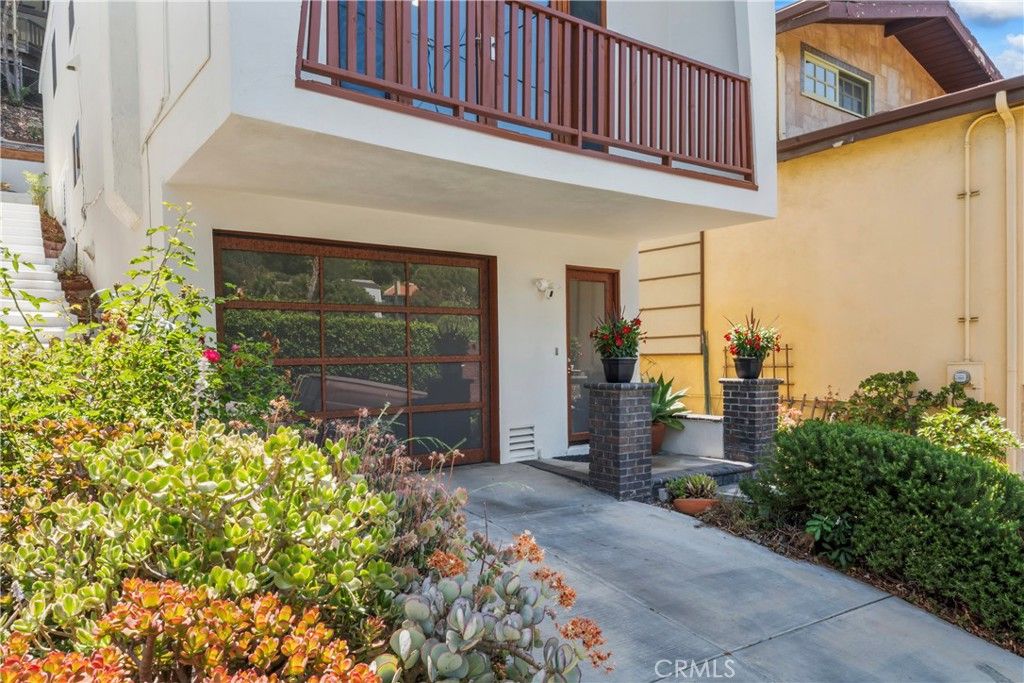 Photo of 2820 Oak Point Drive, Los Angeles, CA 90068 (MLS # OC25157645)