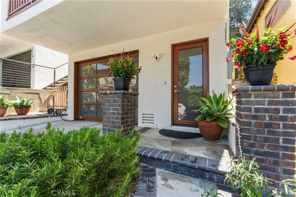 Photo of 2820 Oak Point Drive, Los Angeles, CA 90068 (MLS # OC25157645)