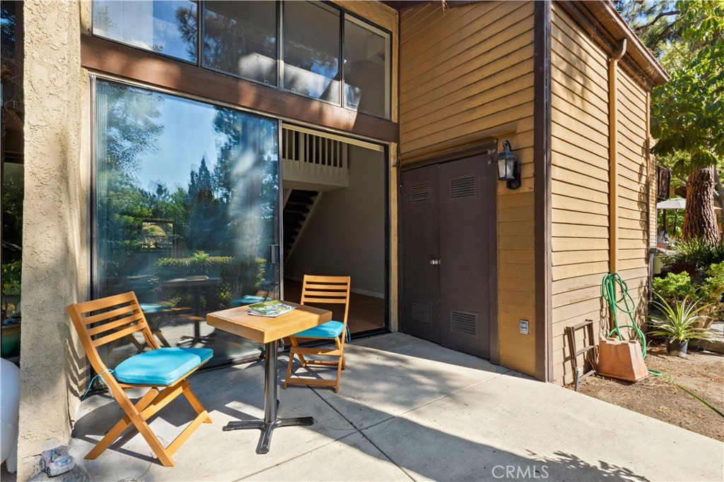 Welcome to the Lakeridge Whittier Condominiums community, situated in Rose Hills! This is your opportunity to own unit 266 in this highly desirable gated community. This unit is a large and modern loft style condo. The generous square footage is 987 square feet. The living room's large sliding doors lead to an outdoor patio that is perfect for relaxing. Interior features include wood flooring, quartz countertops in the kitchen, central heating and air and private laundry. Lakeridge condominiums offer a resort like atmosphere with an abundance of greenery, water streams and amenities. Enjoy amenities such as pools, jacuzzies, a sauna, a gazebo, and tennis courts. A carport style parking is included. HOA is responsible for water and trash. The appliances included are the stove, microwave, and refrigerator. This is your opportunity to potentially be a part of this serene community. You must be here to experience this unique community.