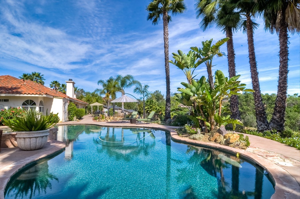 Stunning home in Bottlebrush Estates, with beautiful easterly views on over 2 acres. Gorgeous fountain greets you as pass through the private gate and you enter this wonderful home 4 bedrooms. The resort like swimming pool and spa adds to this entertainers backyard, take in the mountain views as you sit around fire ring. Finished 3 car garage and room for RV parking. Large shed to keep your out door tools and toys. This home offers an open and bright floor plan has so much to offer. Neighborhoods: Bottlebrush Estates Equipment: Garage Door Opener,Pool/Spa/Equipment, Range/Oven, Shed(s) Other Fees: 0 Sewer: Septic Installed Topography: RSLP,GSL