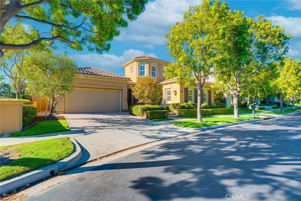 Nestled in the prestigious Bonita Canyon guard-gated community of Newport Beach, this elegant residence offers timeless coastal living with refined upgrades throughout. Featuring 4 bedrooms and 4 bathrooms, the home boasts a bright, open, and airy floor plan with seamless indoor-outdoor flow. The designer kitchen is equipped with stainless steel appliances and opens to inviting living spaces ideal for both entertaining and everyday comfort. The downstairs primary suite opens to the beautifully landscaped backyard through charming French doors, while an upstairs en-suite bedroom offers peaceful separation and privacy. Located minutes from top-rated schools, world-class shopping, fine dining, beaches, and John Wayne Airport, this is Newport Beach living at its finest.