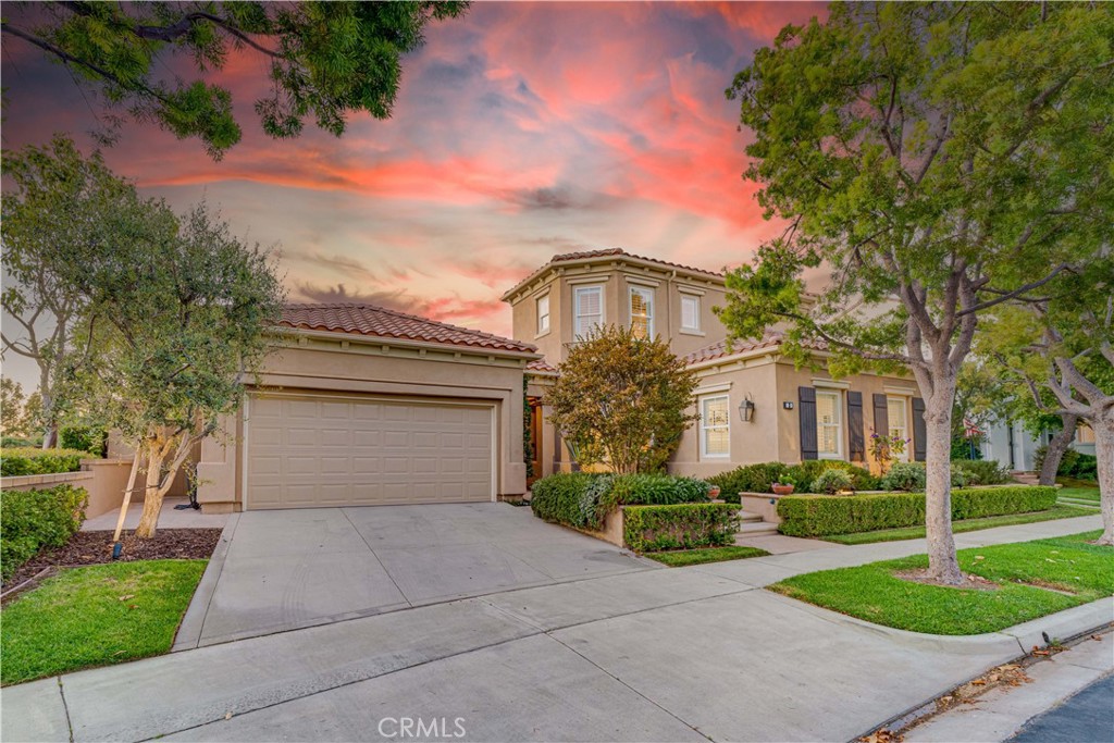 Nestled in the prestigious Bonita Canyon guard-gated community of Newport Beach, this elegant residence offers timeless coastal living with refined upgrades throughout. Featuring 4 bedrooms and 4 bathrooms, the home boasts a bright, open, and airy floor plan with seamless indoor-outdoor flow. The designer kitchen is equipped with stainless steel appliances and opens to inviting living spaces ideal for both entertaining and everyday comfort. The downstairs primary suite opens to the beautifully landscaped backyard through charming French doors, while an upstairs en-suite bedroom offers peaceful separation and privacy. Two adjacent bedrooms located on the other side of house. Located minutes from top-rated schools, world-class shopping, fine dining, beaches, and John Wayne Airport, this is Newport Beach living at its finest!