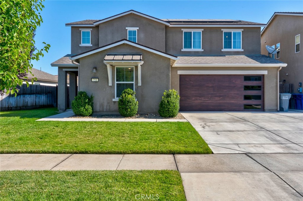 Fall in love with this stunning North Merced home, located near Merced College, UC Merced, local restaurants, and shopping centers! Boasting over 2,500 sq ft of thoughtfully designed living space, this spacious home offers 5 bedrooms and 3.5 bathrooms. Upstairs features four generously sized bedrooms, two full bathrooms, and a large bonus room/loft. Downstairs, discover a private in-law suite complete with its own bedroom, bathroom, kitchenette, and separate entrance, providing flexibility for guests or extended family. You’ll also find a convenient half bathroom for guests on the main level. Step inside and be welcomed by stylish neutral tones and modern finishes. The gourmet kitchen is a chef’s dream with elegant white cabinetry, sleek black hardware, stainless steel appliances, and a spacious island that’s perfect for gatherings. Step outside to your backyard oasis, designed for year-round enjoyment! Enjoy the solar-heated pool, perfect for swimming even beyond the summer months. The covered patio is ideal for entertaining, complete with built-in lighting, a ceiling fan, and an outdoor TV to host unforgettable get-togethers. Additional highlights include owned solar panels, extended concrete, updated garage door and gates. Beautifully maintained and move-in ready, this home is truly a rare find in North Merced. Don’t miss your chance to make it yours!