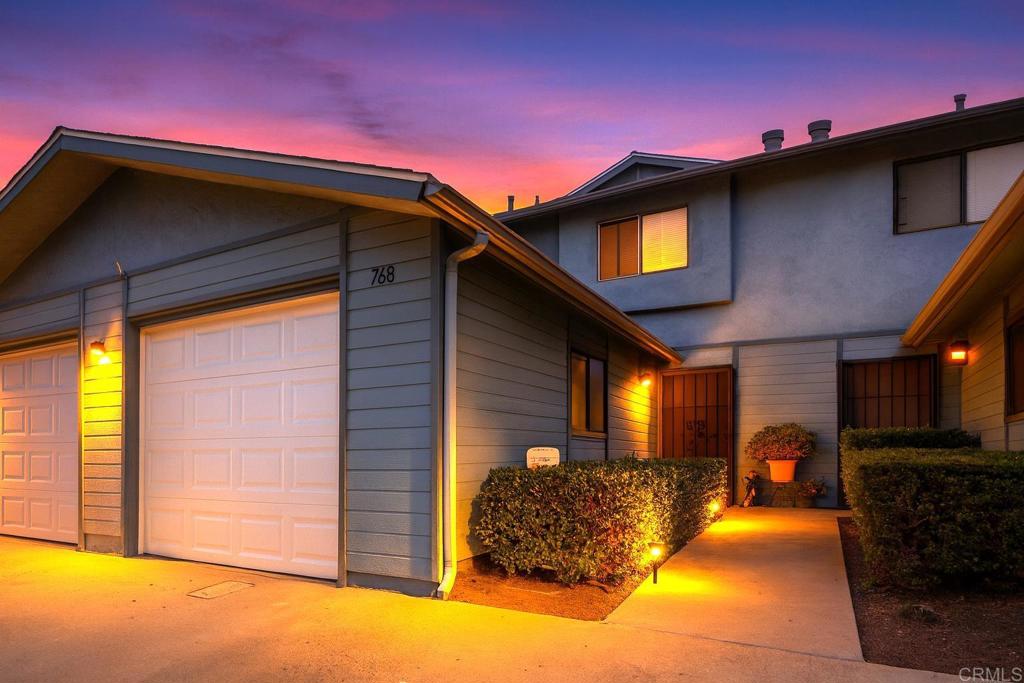 Rarely available 2-story townhome tucked back off the street near Chase & Mollison. This inviting residence features an attached garage with direct access to the unit, a spacious living room, and a private balcony off the primary bedroom. Enjoy a large fenced patio perfect for entertaining, plus the convenience of in-unit washer & dryer. Ideally located in the Valhalla High School district and within walking distance of grocery stores, shops, restaurants and schools. Don’t miss this incredible opportunity—it won’t last long!