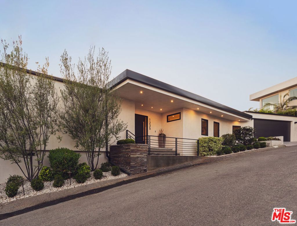Photo of 1235 N Kenter Avenue, Los Angeles, CA 90049 (MLS # 25601075)