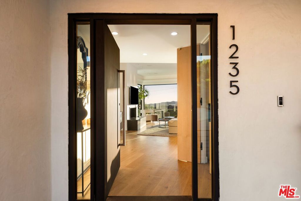 Photo of 1235 N Kenter Avenue, Los Angeles, CA 90049 (MLS # 25601075)