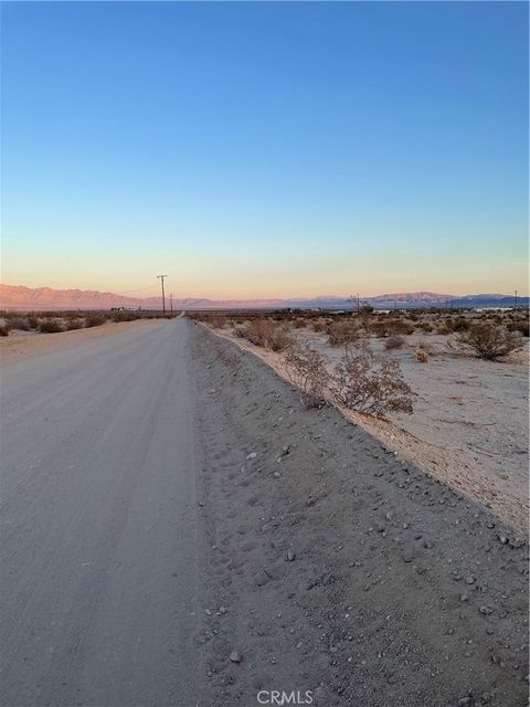 Photo of 78201 Two Mile Rd, 29 Palms, CA 92277 (MLS # JT25241286)
