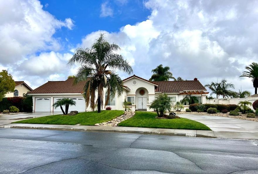Opportunity and potential await in the highly sought after Palisades neighborhood of Poway. This spacious, single-level home with strong bones and endless possibilities sits on over an acre of land. Discover the bright and inviting spaces filled with natural light streaming in from large windows, skylights, and illuminated by the vaulted ceilings, and travertine and marble floors. The easy flow of the home from the living and dining rooms to the family and spacious kitchen makes it easy to entertain. The open kitchen and cozy dining alcove, which need updating, have the potential to be truly amazing. The oversized primary suite is complete with a fireplace, large walk-in closet, and a spacious ensuite bath. The remaining two bedrooms have laminate floors, and one includes a walk-in closet and ensuite bath. For your comfort and convenience, this home boasts updated dual zone central A/C, heating, and water heater. The expansive backyard offers ample space for outdoor activities and the perfect place to enjoy stunning easterly views. A below ground pool and hot tub, which need refinishing, complete the space. This property offers plenty of opportunities to update and make it your own. Don't miss out on this exciting opportunity to own a piece of Poway's serene lifestyle.