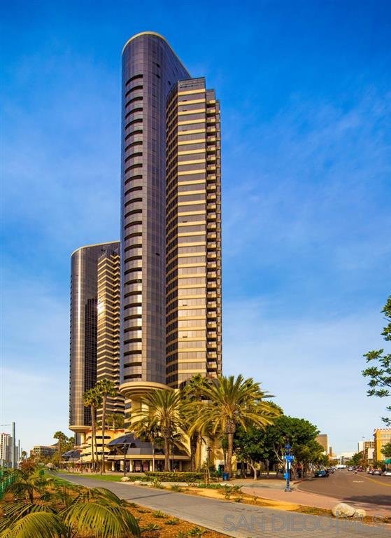 Harbor Club, considered one of the finest hi-rise communities Downtown. Perfectly close to the Harbor, Seaport Village, steps to Little Italy & Ballpark, this fabulous residence is at the crossroads to all the best San Diego has to offer. One of the best floor-plans Downtown , this Bubble design features 2 sumptuous bathrooms, beautiful travertine stone floors, spacious patio, views out to City Lights, Coronado Bridge & Seaport Village. Property is being offered at BELOW MARKET VALUE! Special Assessment ended & is completely paid by seller June 30, 2025. SEE SUPPLEMENTS BELOW BELOW MARKET VALUE! Interior finishes include stone counter-tops, appliances including new washer and dryer & more than ample cabinets & closet space. Kitchen, dining area and living room is equipped for a party of 40 or a romantic dinner for two. Harbor Club w/ it’s ideal location in the Marina District is just steps to Seaport Village, the Headquarters, the Waterfront, Little Italy and to the Ball Park. Harbor Club is designed around the beautifully enhanced exterior grounds with resort-style lap-pool & spa, lush landscaping, fire pits, BBQ area, outdoor dining areas, towering Palms Trees with up-lighting all accentuated by lounging areas & barbecues. Residents and friends may also take advantage of the spacious Community room sited adjacent to the pool area ideally set up for entertaining! Harbor Club has one of the best-equipped fitness centers Downtown and you and your guests will be welcomed in the stunning lobby inclusive of concierge service & 24-hour front desk attendant. This fine residence include 2 parking spaces. Harbor Club is also VA approved.