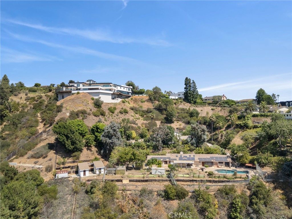 Photo of 10961 Savona Road, Los Angeles, CA 90077 (MLS # SR25202108)