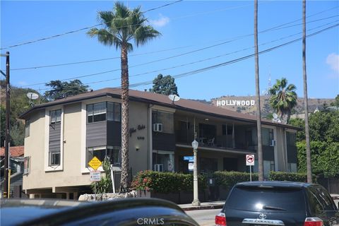 Photo of 2649 N Beachwood Drive, Los Angeles, CA 90068 (MLS # DW25230263)