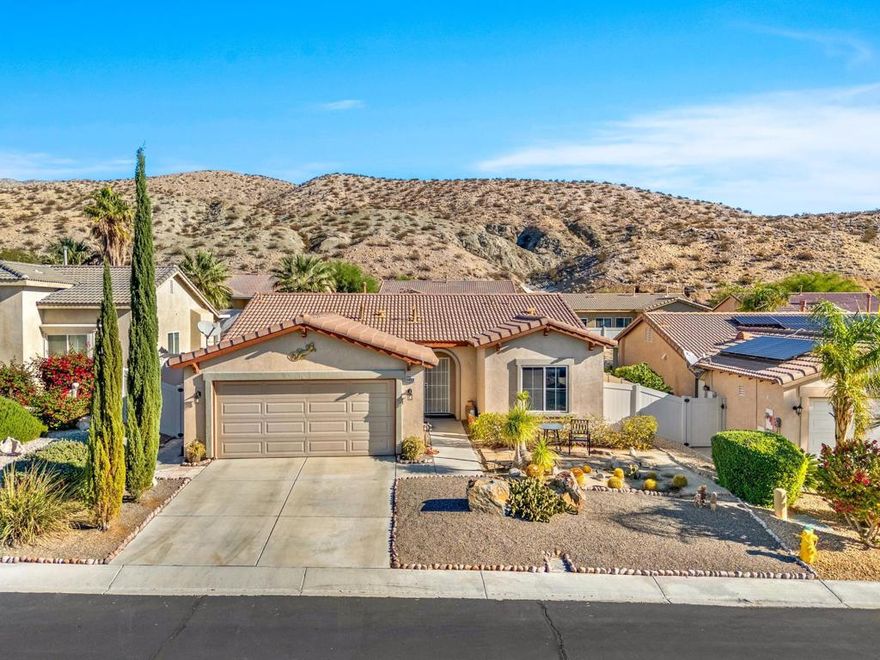 Welcome to this well-maintained 2-bedroom, 2-bath home located in the desirable Mountain View community of Desert Hot Springs. Offering just over 1,200 sq. ft., this home has been thoughtfully updated with a newer private pool, covered back patio, backyard firepit, and a high-efficiency A/C unit to keep you comfortable year-round.Inside, enjoy a renovated kitchen featuring new countertops on both the island and main counter, an open-concept layout filled with natural light, and a spacious primary suite with a beautifully remodeled shower.Set within a gated community comprising just over 300 homes, residents enjoy excellent amenities including community pools, a basketball court, a small park, and low HOA fees. Experience resort-style living in a peaceful neighborhood just minutes from shopping, dining, and downtown Palm Springs.Perfect as a primary residence, vacation retreat, or investment property!