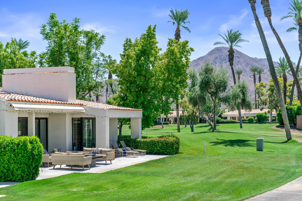 A highly sought after and rare Bayberry plan home in the heart of Desert Horizons Country Club. This extensively upgraded home offers panoramic mountain and golf course views. The many upgrades to this home include engineered wood floors throughout, all newer appliances (Bosch, Kitchen Aid & Thermador), custom cabinetry and quartz counter tops in the kitchen and primary bath. This great room floor plan offers over 2,800 sq.ft. with 3 bedroom suites plus a powder room. Custom folding doors from the great room open to the expansive outdoor living space. Additional features of this charming home include newer windows and sliders, custom built-ins and closets, electric fireplace (Dimplex), tankless hot water heater w/instant hot and 2 new high efficiency Trane AC heat pumps. The garage offers new lightweight garage doors & openers, freshly painted, epoxy floors and a mini split AC unit. And last, but not least, this home has 'owned Solar.' This home is a 'must-see' with its private interior location at the end of a cul-de-sac and steps from a community pool.