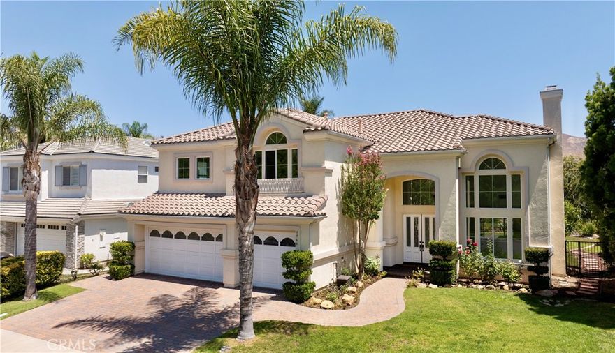 Stunning 5-Bedroom Home for Lease (or Purchase) in the Gated Community of Calabasas View. Located on a quiet cul-de-sac, this beautiful 2-story home offers breathtaking canyon and hillside views. Featuring 5 spacious bedrooms, 4 1/2 bathrooms, 3,600 square feet of living space and a 3-car garage, this home is perfect for those seeking comfort and style. The home is located in the award-winning Las Virgenes School District. Enjoy an open floor plan with vaulted ceilings, abundant natural light, and a formal dining room. Recently remodeled, the chef-inspired kitchen opens to the family room, making it ideal for entertaining. The home features a large, private primary bedroom with an expansive en-suite bathroom and a spacious walk-in closet. A downstairs bedroom and full bath offer convenience for guests or multi-generational living. The versatile large landing area upstairs is perfect for a child’s play area or home office. Ideal for outdoor gatherings, the backyard offers sweeping views of the canyons and hills, along with a grassy area for pets. Newer wood-look flooring, carpeting, and fresh paint throughout give the home a modern, move-in ready feel. The home is unfurnished, though the owner is willing to offer select furniture pieces for the tenant's use if desired. This rare find in a picturesque, tree-lined neighborhood has close proximity to Erewhon Organic Groceries, The Commons, Westlake Promenade and a quick 15 minute drive to the beaches of Malibu and Pepperdine University. Nearby is De Anza Park and biking and hiking trails. Available for immediate occupancy. Pets okay! This home is also available for purchase.