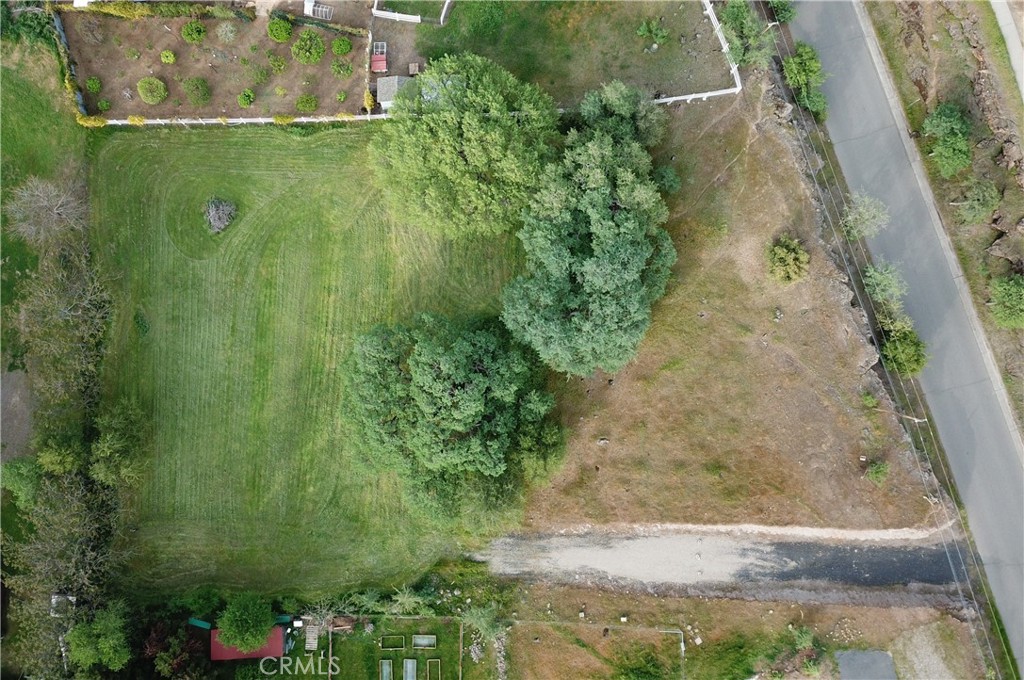 Tucked along the tranquil curve of Chico Canyon Road, this picturesque 1.02-acre parcel is a rare opportunity to bring your dream home to life in one of Chico's most sought-after locations. Surrounded by natural beauty and just moments from Annie Bidwell Trail and Lower Trail Trailhead, this property invites a lifestyle of morning hikes, afternoon bike rides, and evening strolls beneath the canopy of Upper Bidwell Park. Imagine building a custom retreat where you can enjoy peaceful seclusion without sacrificing convenience, just minutes from 5-Mile Recreation Area, Hook Hooker Oak Park, Lower Bidwell Park, and top-rated schools. Whether you envision a modern farmhouse, a contemporary masterpiece, or a cozy hideaway among the trees, the possibilities here are as open as the sky above. Don't miss the chance to craft something truly special on this blank canvas in the heart of Chico's natural splendor.