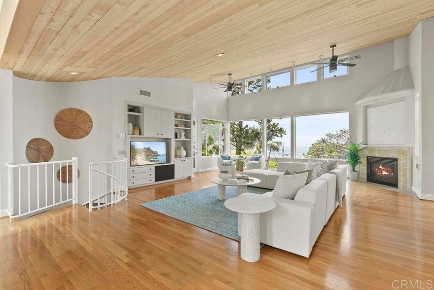 Location, Location, Location. Sweeping WHITE WATER ocean views from the living room, kitchen, and primary suite! Homes lives like a SINGLE STORY, with all living and primary bedroom space on same level as the street and garage. Two balconies to continue enjoying your views outside are also off of the living room. Two additional, large bedrooms and bathroom en-suites are downstairs with access to the backyard. Stunning garden with two spas ideally centered to take in more white water views of the ocean. Moments from the quaint village of Del Mar to enjoy restaurants, shopping and culture. Grab your beach toys and head down for for a day at the beach. This home provides the lifestyle you've been dreaming of!