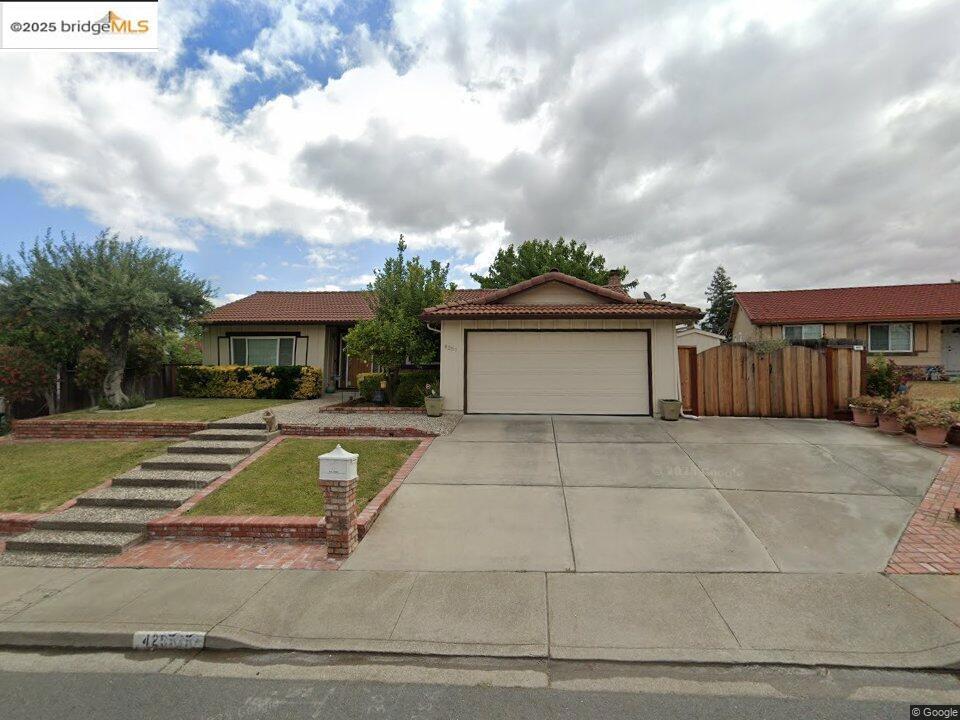 First time on the market since it was originally purchased! Open House this weekend, come and see this well maintained property that shines with pride of ownership throughout the years. Just a short trip off of the freeway, this single story home is suited well for a first home buyer or investor. This neighborhood gem is just up the street from the local park as well as schools. It has been updated throughout the years with a newer HVAC system, flooring, as well as matching kitchen appliances and new kitchen counter tops. The home has been hosting family events over the years with its ease of access flowing from the front family room into the kitchen, dining room, living room and on out to the back patio. There is an expanded driveway for extra parking that leads into the side yard with a lockable boat gate fence. A well manicured front and back yard come finished with a sprinkler system and a separate area in the backyard for growing your own plants. The trees throughout the property provide a variety of beauty, shade, and the occasional seasonal fruits. Store all you need for the yard and then some in the outdoor shed complete with shelving. Put the finishing decor touches on this blank canvas waiting for you to make it your home.
