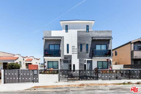 Photo of 4615 St Charles Place #1/2, Los Angeles, CA 90019 (MLS # 26838565)