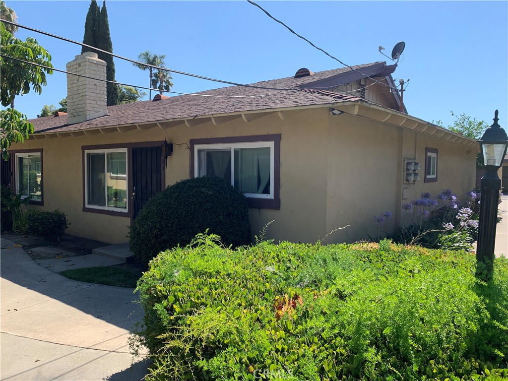 Currently Two Bedroom (as was built originally), but can easily be a Three Bedroom! Remodeled with new flooring, new kitchen, quartzite counters, new cabinets, new sink; new paint, new bathroom vanity. Large bedrooms, inside laundry connections. Ceiling fans in each room. Fireplace. This Gated community is very sought-after and this unit is special because it has both a private carport located directly behind the private patio, PLUS a separate, enclosed garage located only 100' away (yes, this unit has TWO dedicate parking spaces!). Community pool. Super close to Thomas Edison (1526 Romneya Ave) elementary school. So convenient in fact, you and your children will not have to cross a single street when you walk them to school. Sycamore Junior High located directly across La Palma Ave.