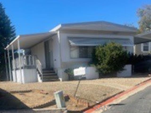 Rare opportunity to have resident ownership in this all-age community. No space rent or landlease fees. 2 bedrooms and 2 bathrooms, in unit full sized laundry, mature fruit trees, room for a vegetable garden, and storage shed! Great location and low HOA fees. This unit is ready for you to create the space you are dreaming of.